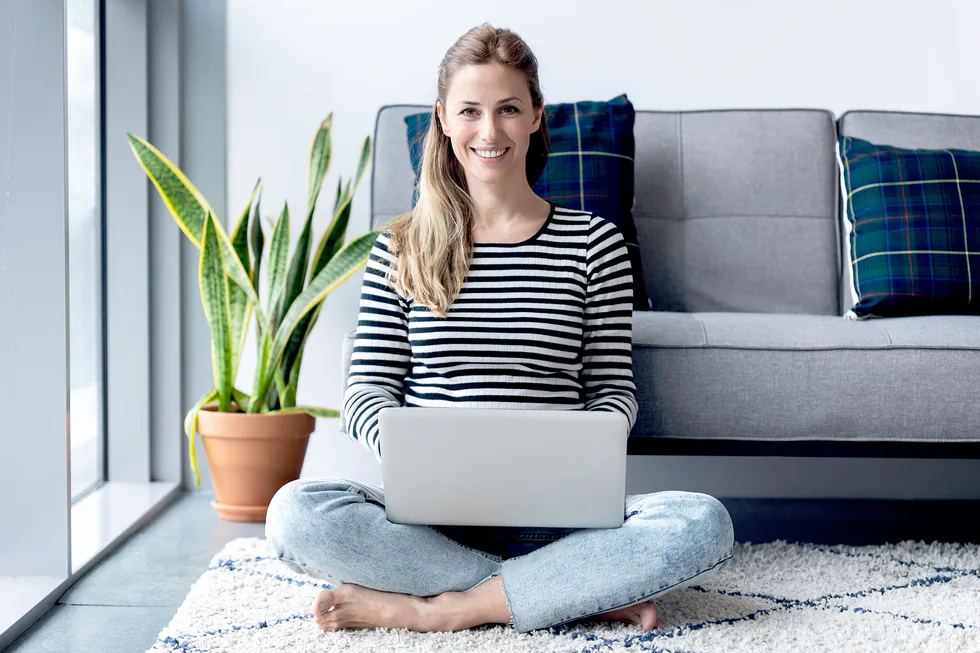 Woman working from home on a laptop